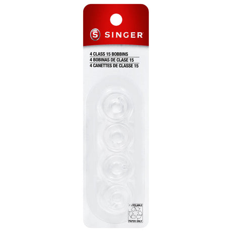 SINGER packet marked four Class 15 bobbins, showing transparent bobbins.